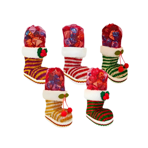 Šventinė dovana „Batas“ su 350 g šokoladinių saldainių su lazdynų riešutais.