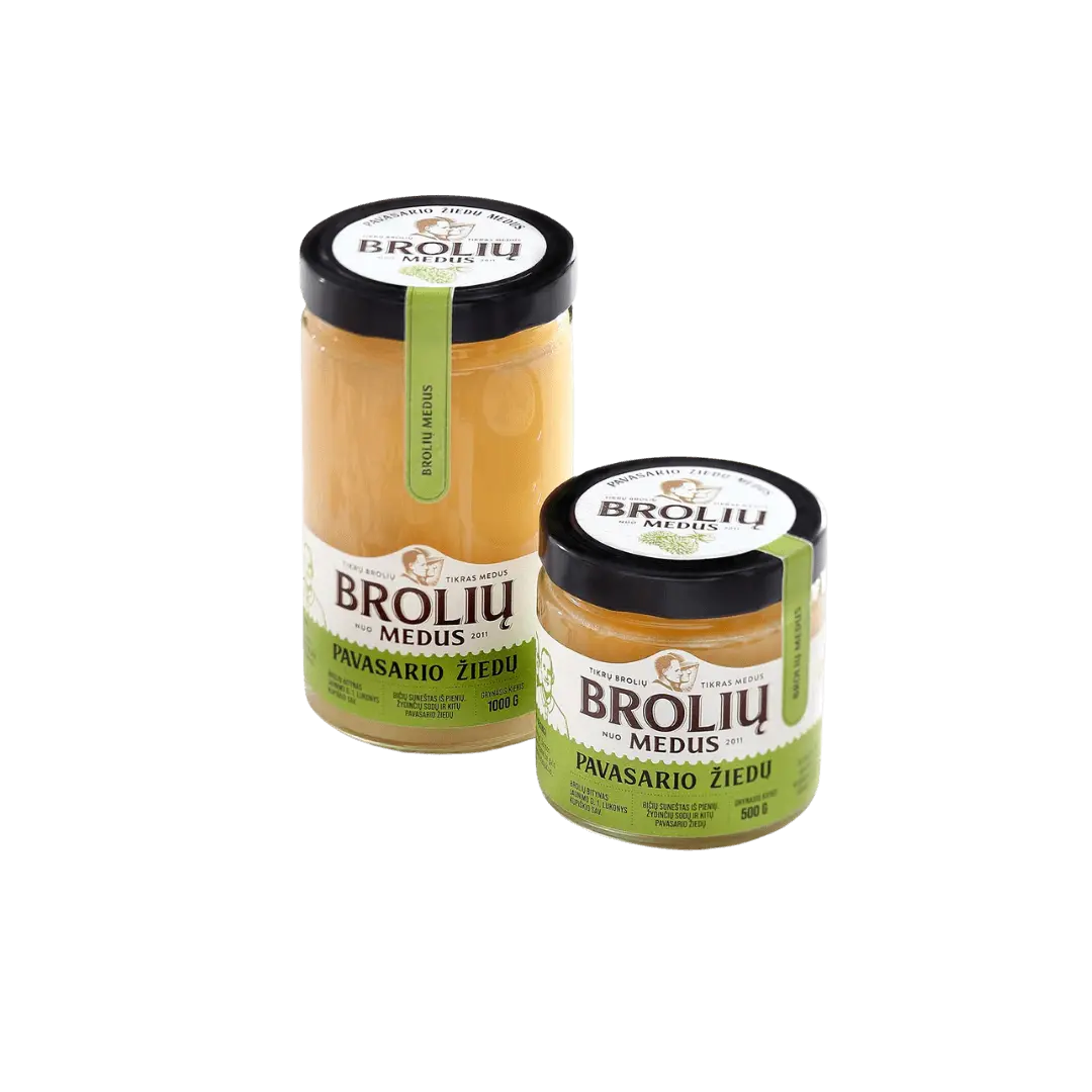Pavasarinis medus – lietuviškas pavasario žiedų medus, stiklainėlis 500 g arba 1000 g, kreminės konsistencijos, švelnios spalvos.