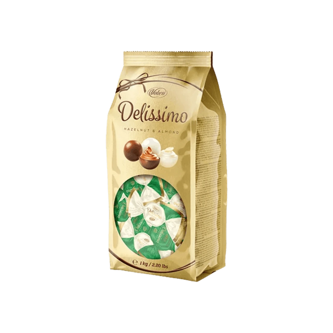 Delissimo rutuliuko formos praline saldainiai su lazdynų riešutais ir migdolais, dengti pienišku šokoladu arba baltu kremu, 1 kg pakuotė.