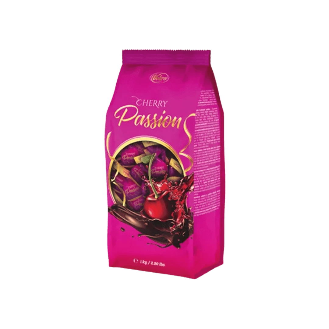 Prabangūs praline „Cherry Passion“ – kalvelės formos saldainiai su vyšnia alkoholiniame įdare, padengti desertiniu šokoladu, 1 kg pakuotė.